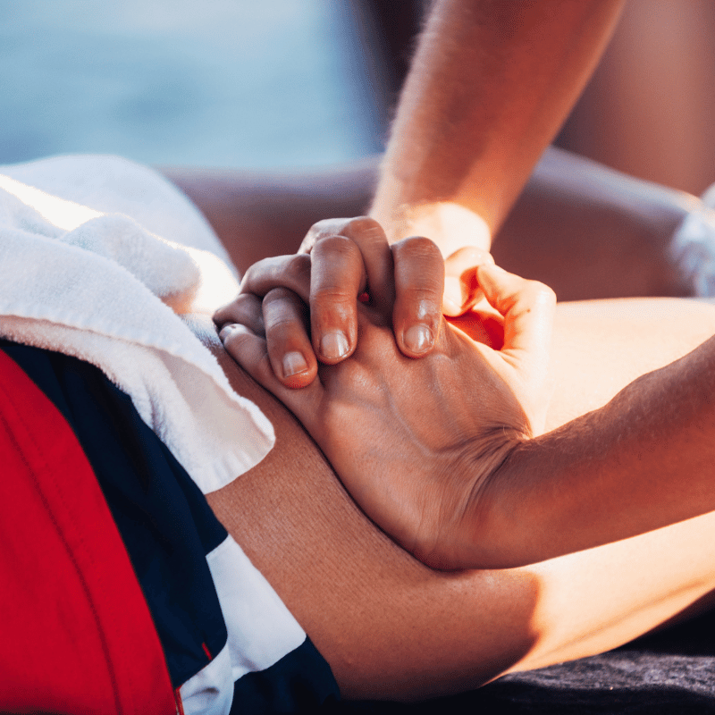 A person receiving a massage at an event.